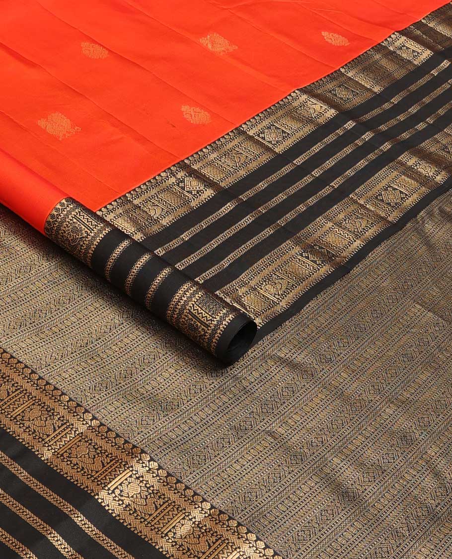 Orange zari buttas silk saree, contrast border of thilakam, Muthu, kathir, mayil kann and  mayil designs and geometric patterned pallu