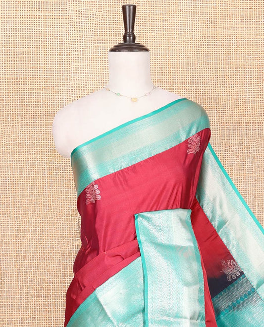 Red Budget Silk Saree, Gracefully Embellished with Zari Buttas All Over Its Body, Complemented by a Contrast Traditional Zari Design Border, Intricately Designed Pallu, and Paired with a Contrast Blouse
