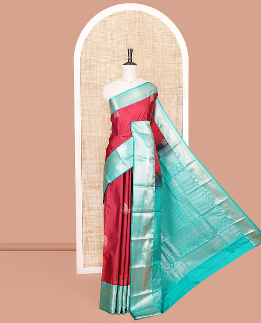 Red Budget Silk Saree, Gracefully Embellished with Zari Buttas All Over Its Body, Complemented by a Contrast Traditional Zari Design Border, Intricately Designed Pallu, and Paired with a Contrast Blouse
