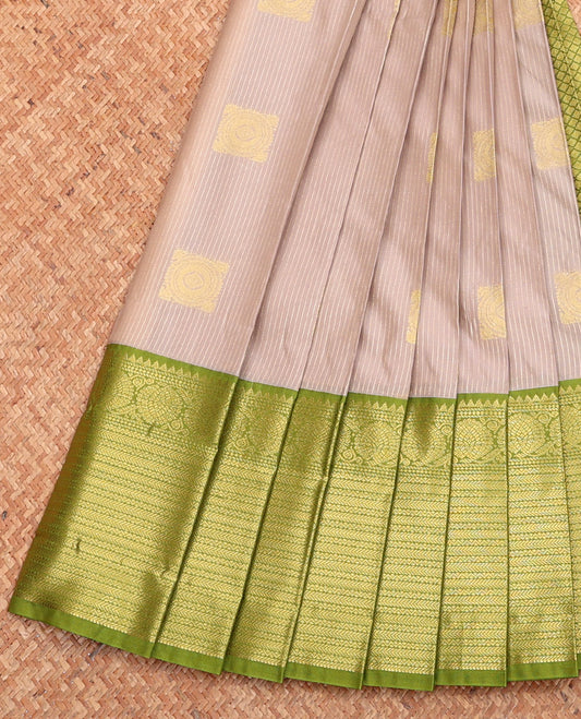 Grey Budget Silk Saree, Sparsely Decked with Zari Buttas, Complemented by a Contrast Traditional Zari Border, Jaal Pallu, and Contrast Blouse