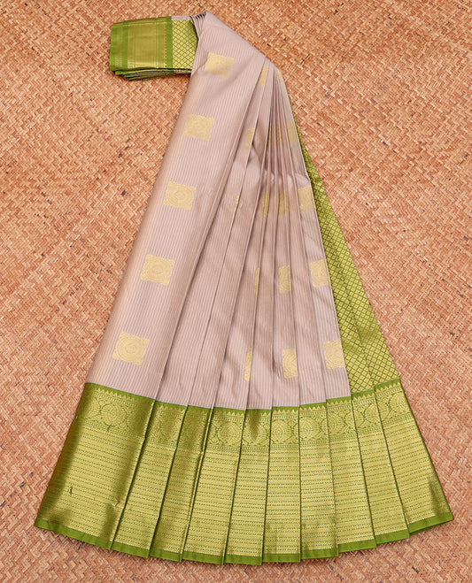 Grey Budget Silk Saree, Sparsely Decked with Zari Buttas, Complemented by a Contrast Traditional Zari Border, Jaal Pallu, and Contrast Blouse