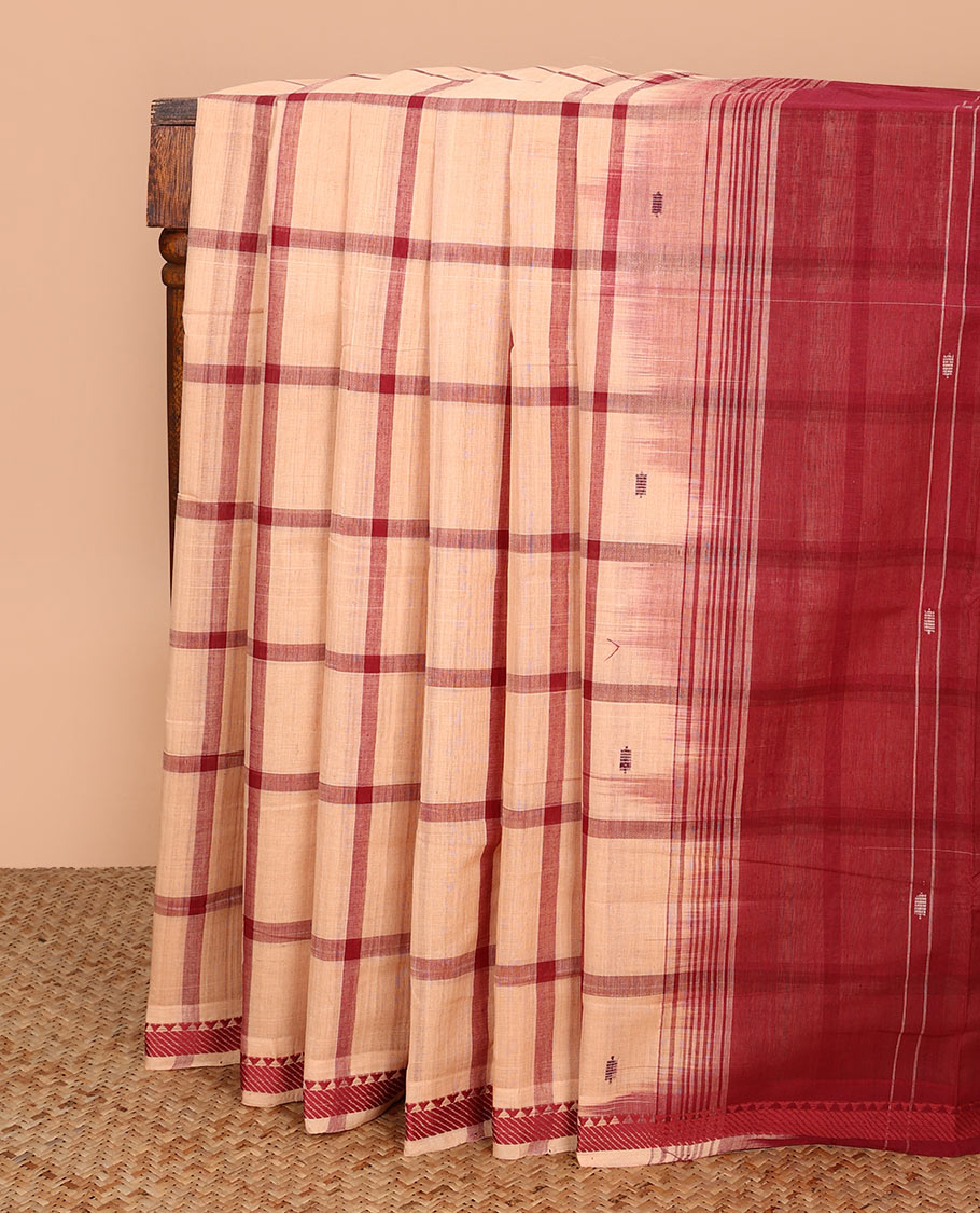 Sandal buttas enclosed checked Andhra cotton saree, traditional motifs thread border, and contrast pallu of stripes and buttas