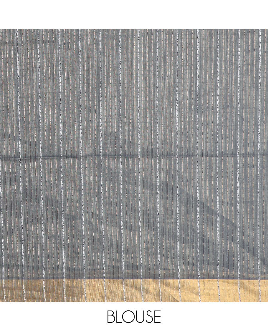 Grey plain jute cotton saree, zari bavanji border, and striped pallu