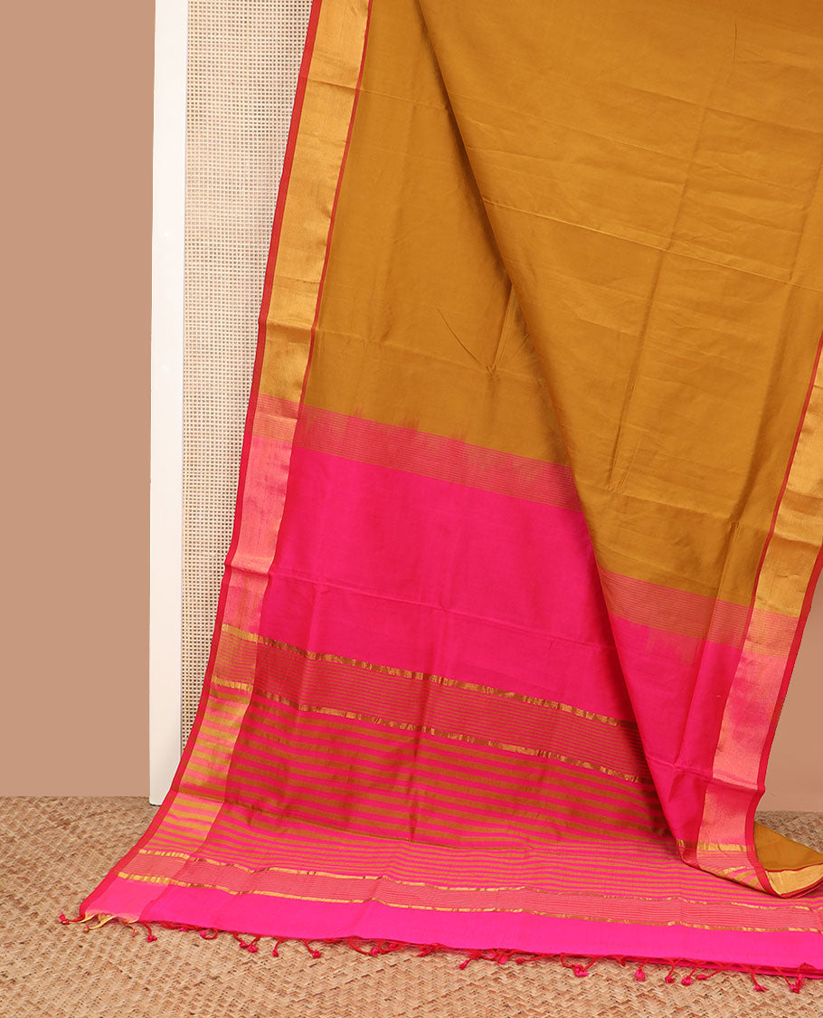Honey color plain poly cotton saree, bavanji border, and contrast striped pallu