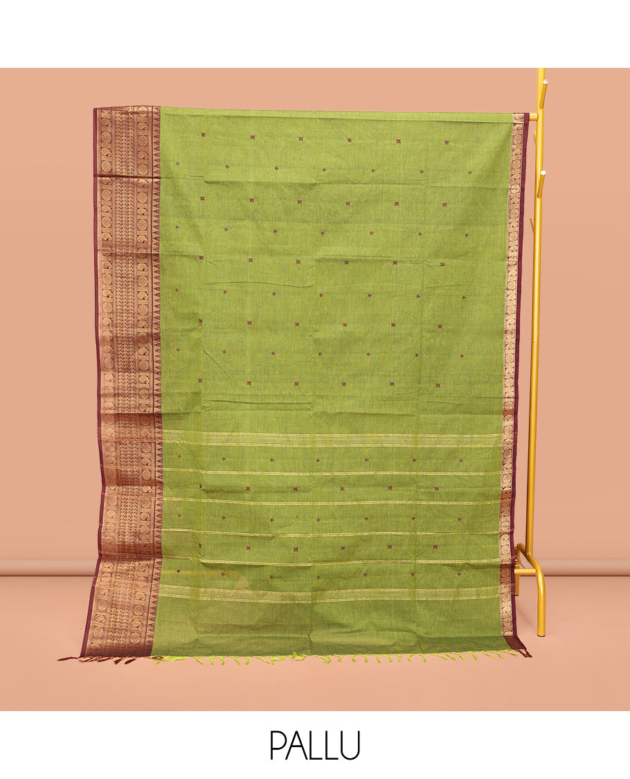 Green Chettinad Cotton Saree, Bedecked with Thread Buttas All Over Its Body, Complemented by a Contrast Traditional Zari Design Border, Pallu of Stripes, and Buttas, and Paired with a Matching Blouse