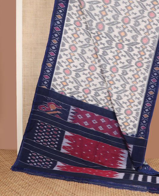 Cream-base unique motifs ikkat cotton saree, contrast ikkat buttas border & pallu of diamond & peacock designs