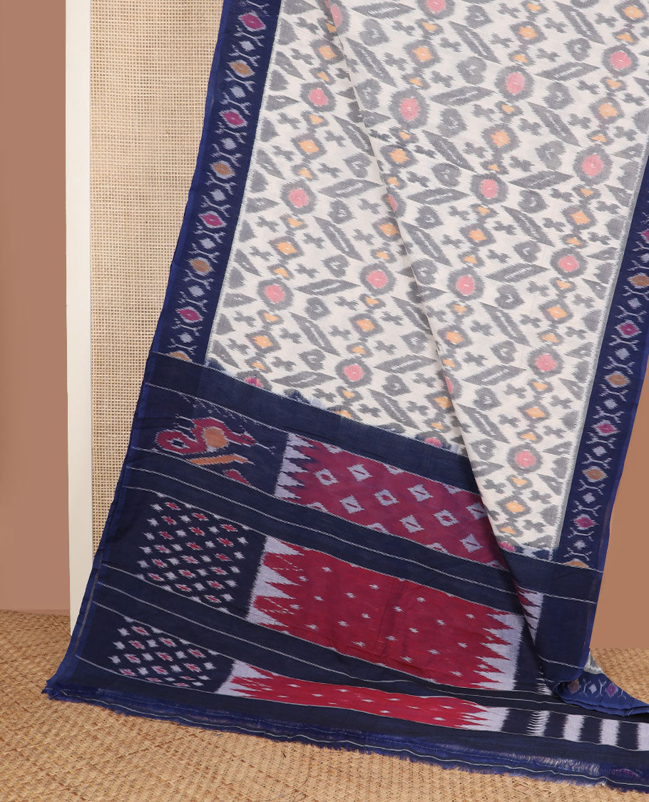 Cream-base unique motifs ikkat cotton saree, contrast ikkat buttas border & pallu of diamond & peacock designs