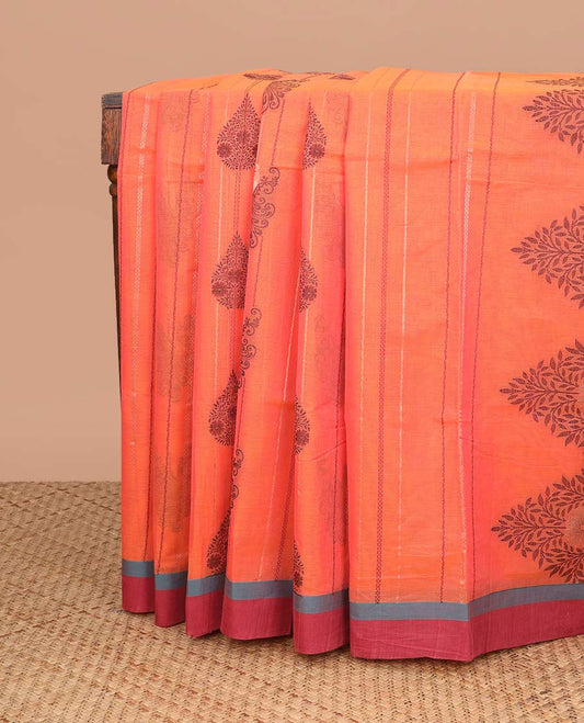 Orange all-over floral design coimbatore cotton saree with contrast plain border