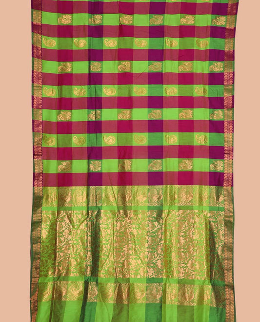 Multi-color peacock and paisley butta enclosed checked nine-yard cotton saree, traditional zari border, and floral vine zari pallu