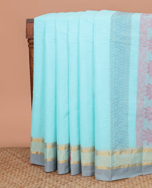 Baby blue buttas kanchi cotton saree, contrast border of paisleys, and floral motif pallu