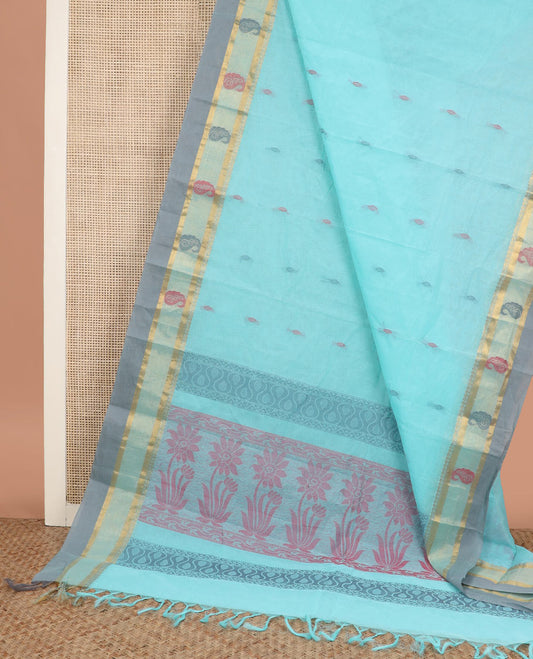 Baby blue buttas kanchi cotton saree, contrast border of paisleys, and floral motif pallu
