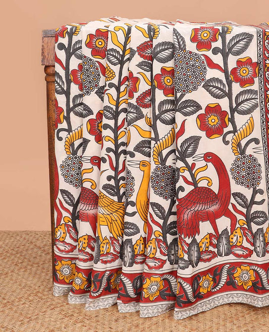 Cream floral and bird machine printed kalamkari cotton saree, contrast floral printed border, and rangoli style motifs pallu