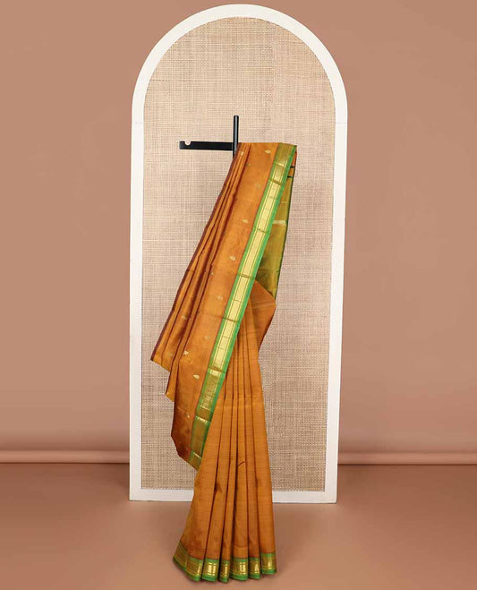 Brown buttas kancheepuram silk saree with contrast zari design border & zari design pallu