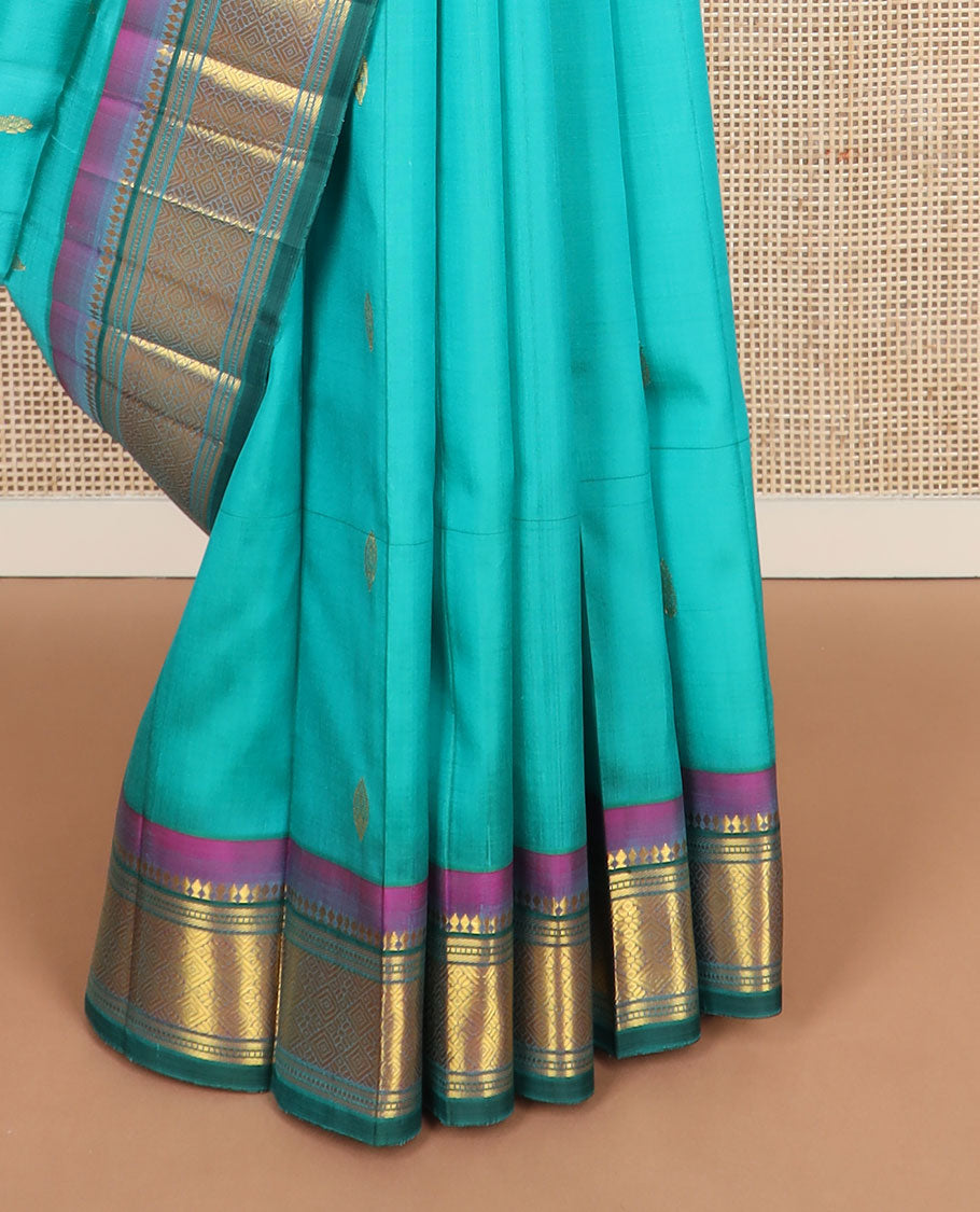 Blue zari buttas kanchipuram silksaree, contrast one-sided border of paneer sombu,banaras,muthu & jaal design & zari design pallu