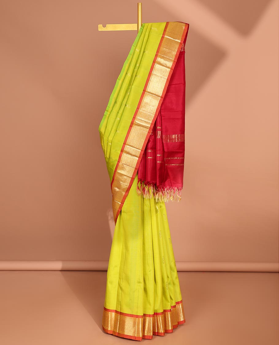 Green  floral buttas kancheepuram silk saree with contrast border of sombu,banaras,jaal design & zari design pallu