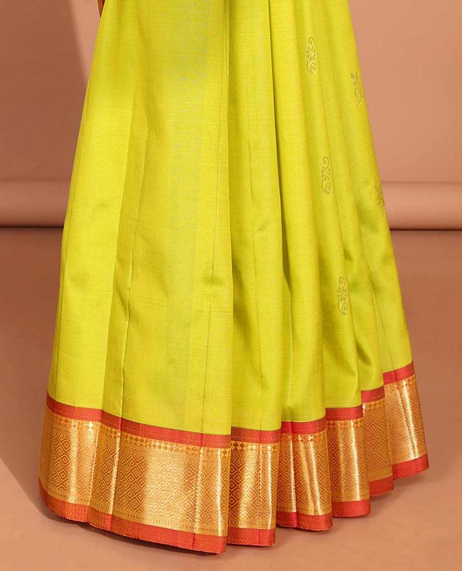 Green  floral buttas kancheepuram silk saree with contrast border of sombu,banaras,jaal design & zari design pallu