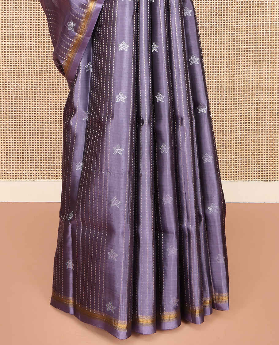 Lavender Mayuri Lite Silk Mix Saree, Adorned with Buttas and Muthu Stripes All Over Its Body, Highlighted by a Zari Border, Pallu of Intricate Designs, and Paired with a Matching Blouse