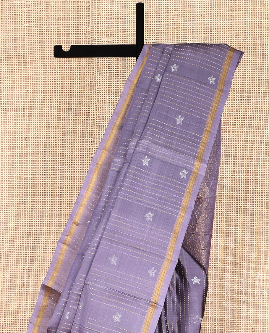 Lavender Mayuri Lite Silk Mix Saree, Adorned with Buttas and Muthu Stripes All Over Its Body, Highlighted by a Zari Border, Pallu of Intricate Designs, and Paired with a Matching Blouse