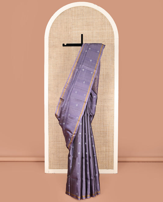 Lavender Mayuri Lite Silk Mix Saree, Adorned with Buttas and Muthu Stripes All Over Its Body, Highlighted by a Zari Border, Pallu of Intricate Designs, and Paired with a Matching Blouse