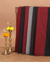 Borderless black color-blocked jute cotton saree, striped pallu with tassels