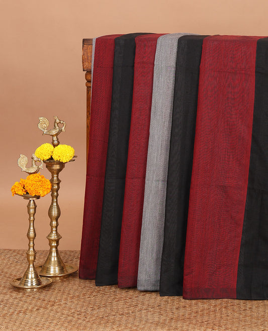 Borderless black color-blocked jute cotton saree, striped pallu with tassels