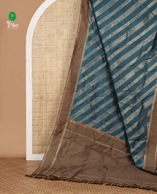 Blue golden zari striped burberry silk saree, contrast zari border & pallu features 1000 dobby-style buttas