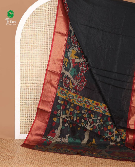 Black skirt-style kalamkari printed dola silksaree, contrast copper zari border,flora-fauna print pallu & zari border blouse