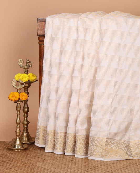 Half-white triangle motifs zari-woven viscose georgette saree,floral creeper zari border, lining seer pallu & zari design running blouse