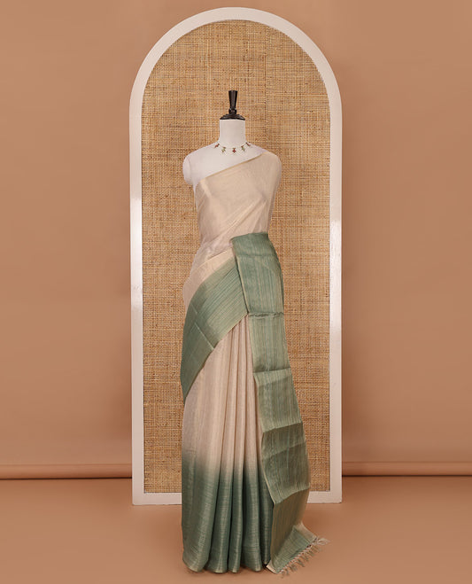 Borderless sandal-green plain ombre-colored tissue saree, plain pallu & circle motifs printed blouse