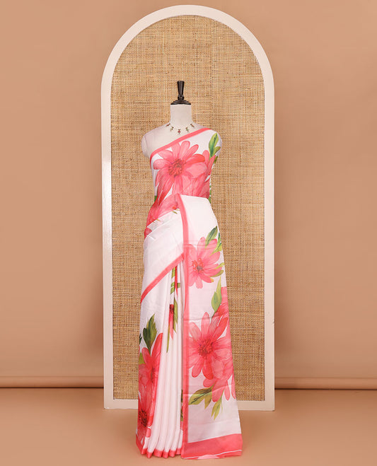 Cream base digital printed satin crepe saree with big pink floral motifs all over the saree, plain pink border & blouse