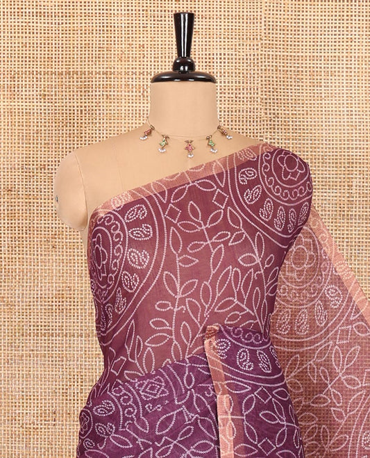 Wine bandhani-style floral and chakra printed saree, zari piping border, contrast ajrakh printed pallu, and contrast ajrakh printed blouse