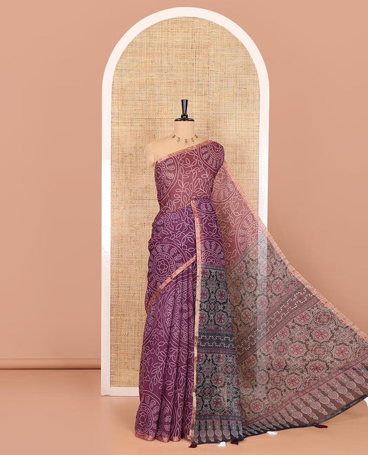 Wine bandhani-style floral and chakra printed saree, zari piping border, contrast ajrakh printed pallu, and contrast ajrakh printed blouse