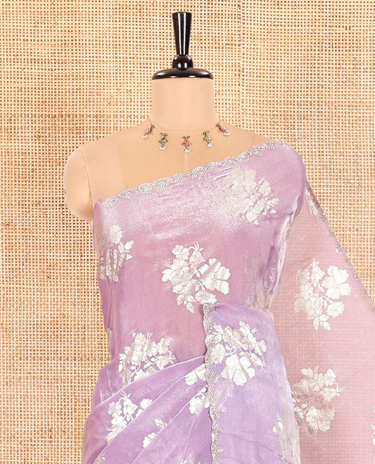 Lavender Fendi Satin Saree Prettified with Floral Motifs in Golden Foil Prints, Sparkling Scallop Swarovski Stone Work Border, Pallu of the Same Foil Prints, and Comes with a Matching Colored Stone Work Blouse