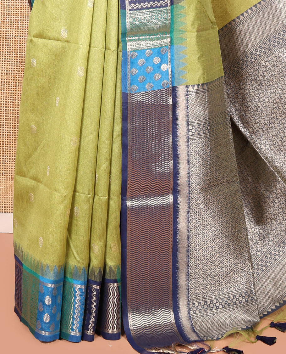 Green Semi-Raw Silk Saree, Adorned with Buttas All Over Its Body, Complemented by Contrast Meenakari-Style Woven Border of Geometric Zari Designs, Majestically Detailed Pallu, and Paired with a Contrast Blouse