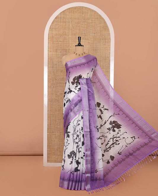 White and Violet Linen Cotton Saree, Elevated with Silhouette-Style Floral Motifs Printed on Its Body, Complemented by Contrast Bavanji Border, Pallu of Silhouette-Style Floral Print, and Comes with a Matching Blouse