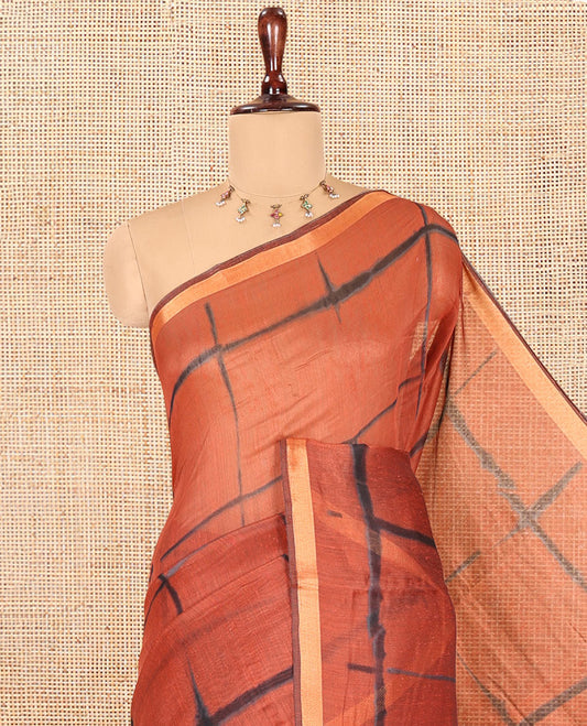 Rust Linen Cotton Saree, Adorned with Shibori Checks, a Subtle Piping Border, Geometric Pallu, and a Matching Blouse
