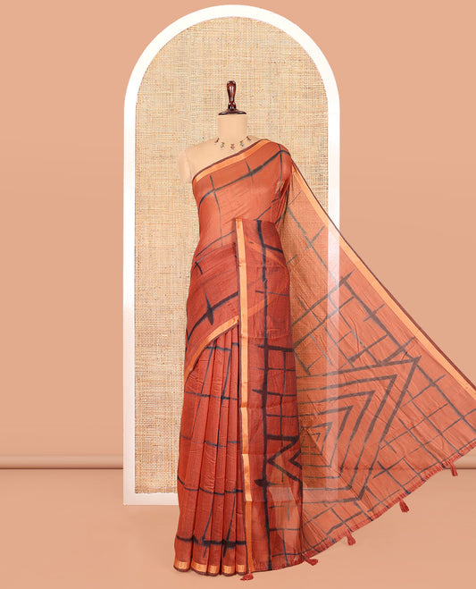 Rust Linen Cotton Saree, Adorned with Shibori Checks, a Subtle Piping Border, Geometric Pallu, and a Matching Blouse