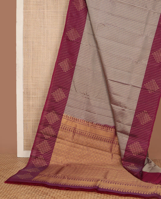 Grey vasundhara elite silk saree with zari buttas, contrast border of zari designs & pallu of manga & jaal designs