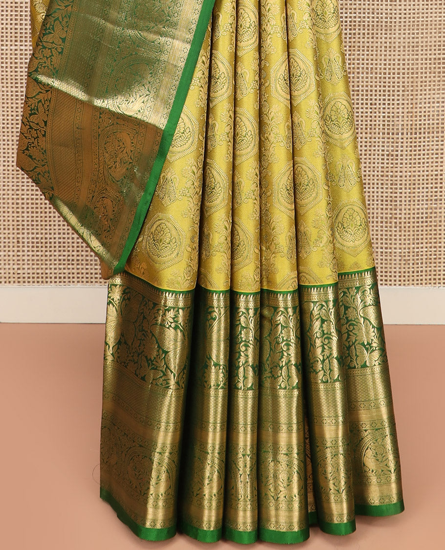 Yellow Kanchipuram Silk Saree Adorned with Jacquard Design, Complemented by Contrast Border of Rekku, Kathir, Mayil, Butterfly, and Then Kuli Kann Designs, Pallu Woven with Intricate Zari Designs, and Paired with a Contrast Blouse