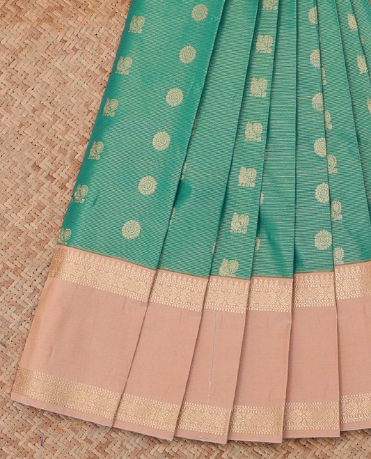 Green Budget Silk Saree, Artfully Detailed with Stripes and Peacock-Chakram Buttas, a Contrast Traditional Zari Rettai Pettu Border, Sparsely Woven Pallu, and a Contrast Blouse