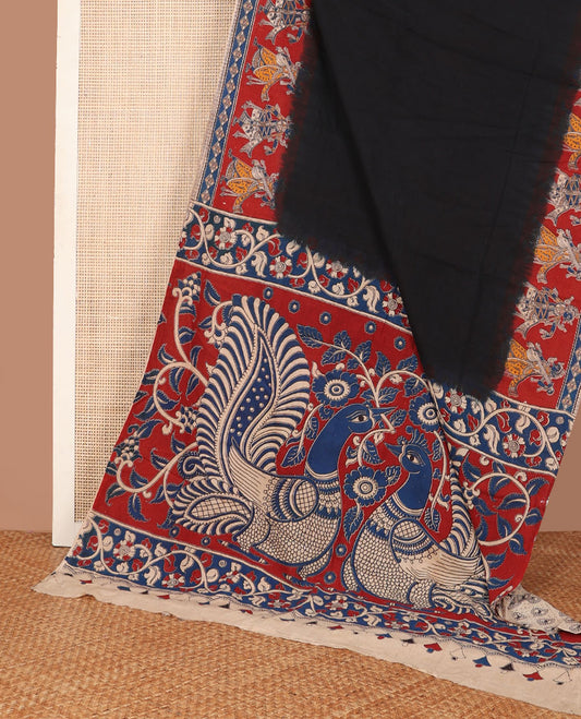 Black plain machine-printed kalamkari cotton saree, contarst human figurines printed border & pallu of peacock & floral vine print