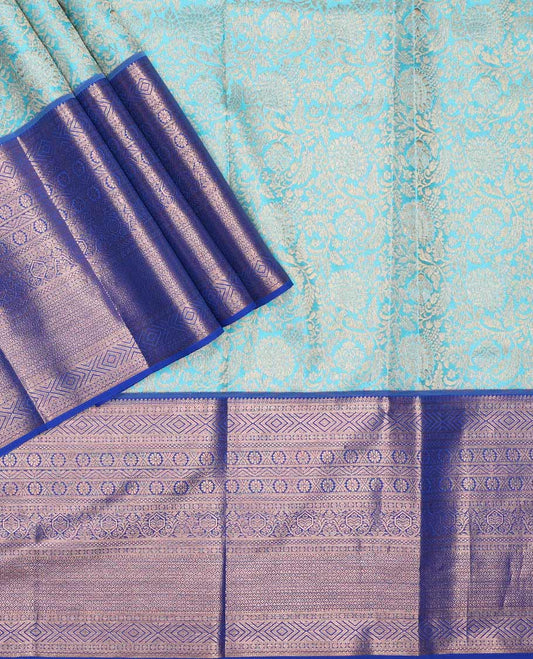 Blue pure silk half-saree, floral jaal jacquard with contrast traditional zari bordered skirt, contrast zari design blouse, and zari design dhavani