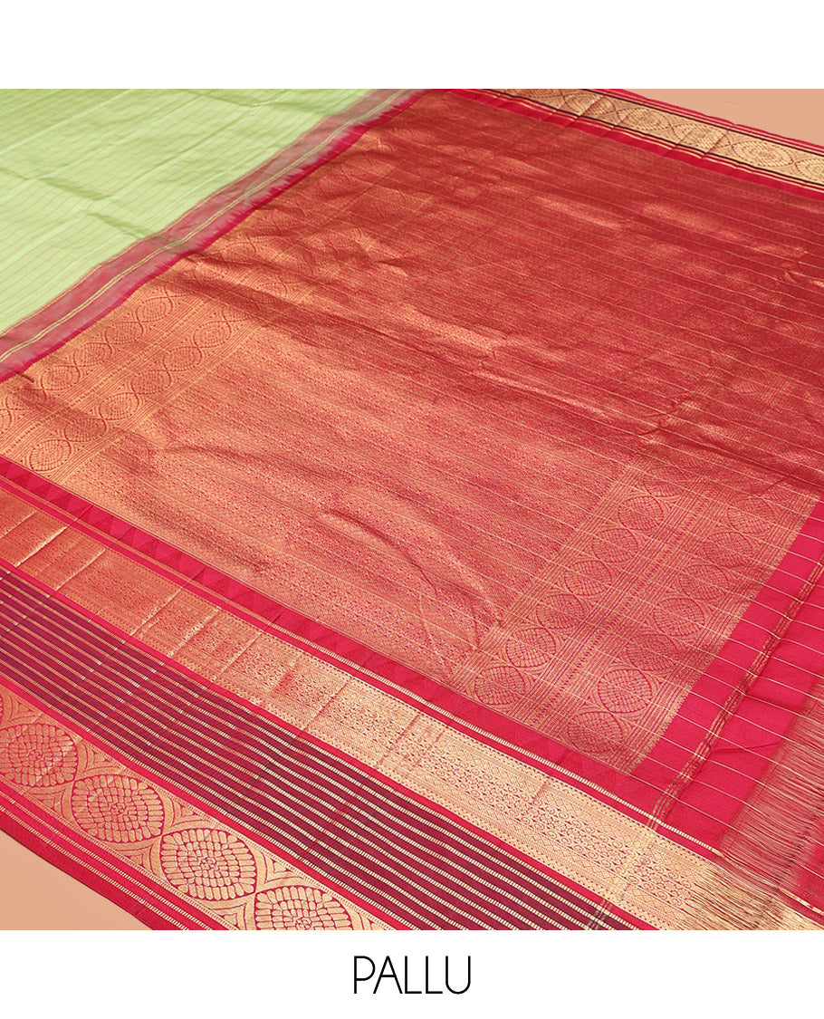 Green Vasundhara Silk Saree Subtly Sparkled with Stripes, Highlighted by a Contrast Border of Muthu, Diamond, Kamalam, and Laddu Kamalam Designs, Delicately Woven Pallu of Intricate Designs, and Paired with a Contrast Blouse
