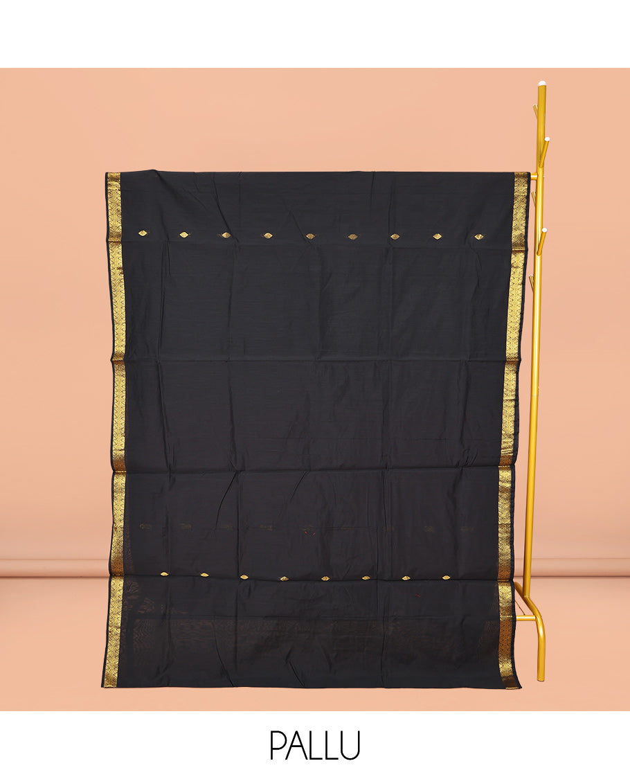 Black Maheshwari Cotton Saree, Gleamed Up with Buttas All Over Its Body, Highlighted by Zari Traditional Border, Complemented by a Contrast Pallu Steeped with Buttas, and Paired with a Contrast Blouse