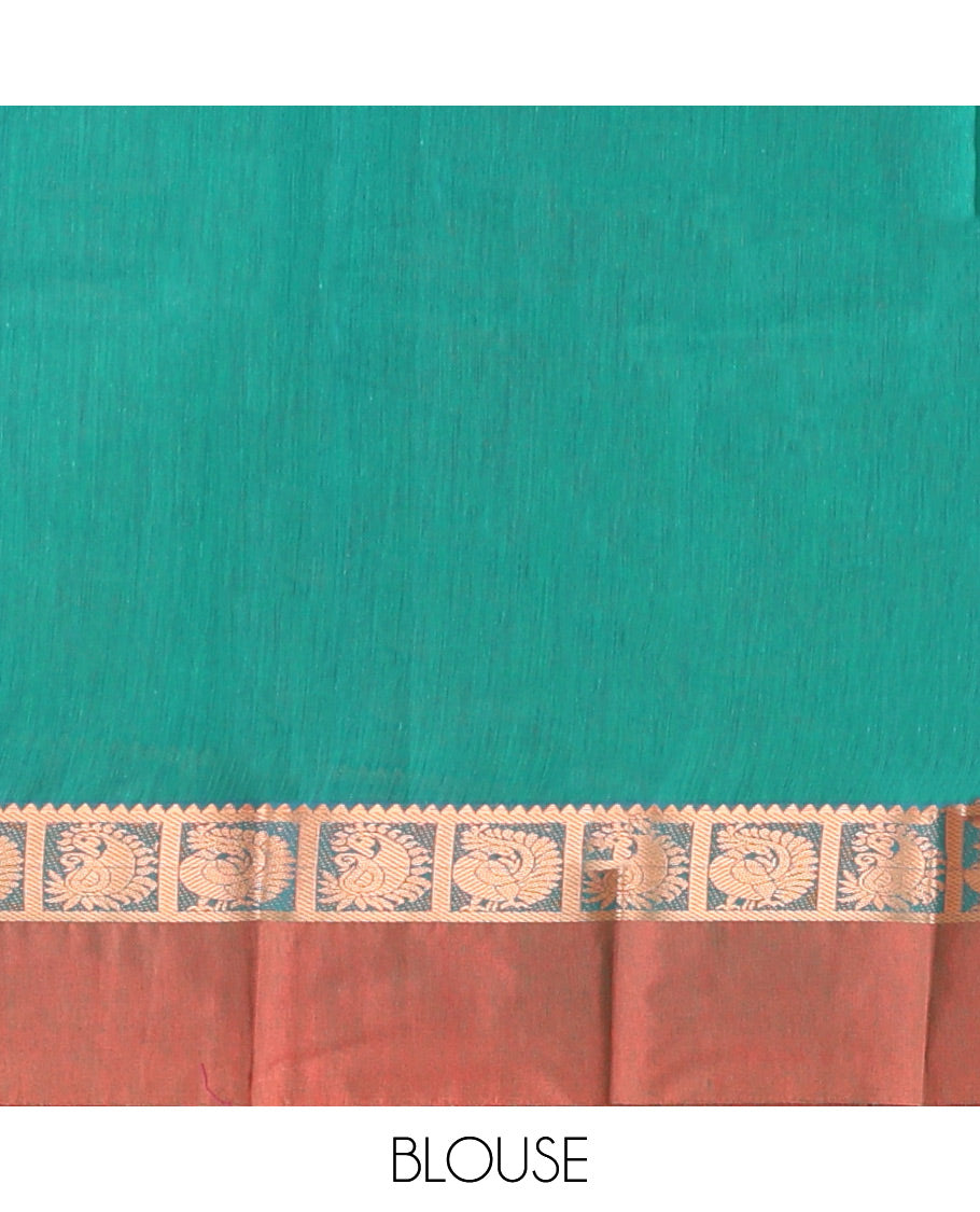 Green Semi-Silk Cotton Saree, Impeccably Styled with Buttas All Over Its Body, Complemented by a Contrast Peacock Design Kal Eragina Border, Pallu Steeped with Elephant Design, and Paired with a Matching Blouse