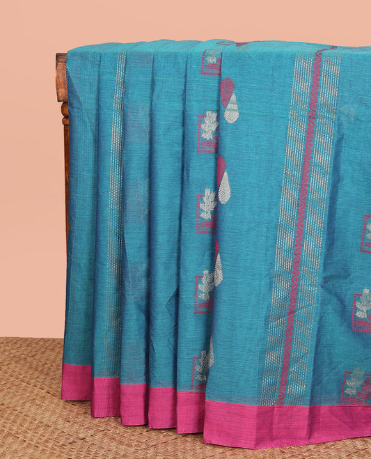 Blue Coimbatore Cotton Saree, Mesmerized with Stripes and Buttas All Over Its Body, Complemented by a Contrast Border, Pallu Pictures Floral Patterns, and Paired with a Matching Blouse