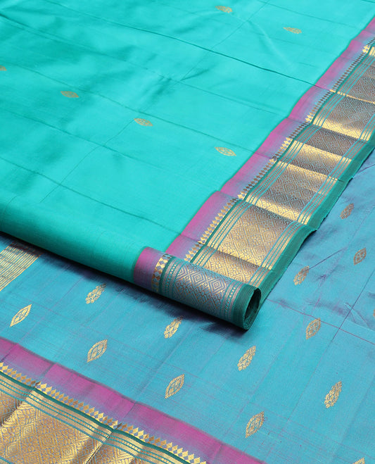 Blue zari buttas kanchipuram silksaree, contrast one-sided border of paneer sombu,banaras,muthu & jaal design & zari design pallu