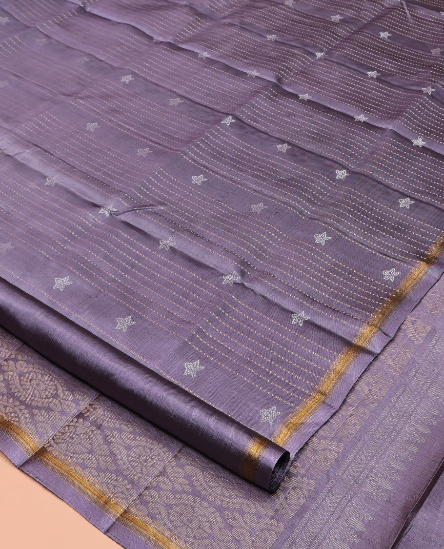 Lavender Mayuri Lite Silk Mix Saree, Adorned with Buttas and Muthu Stripes All Over Its Body, Highlighted by a Zari Border, Pallu of Intricate Designs, and Paired with a Matching Blouse