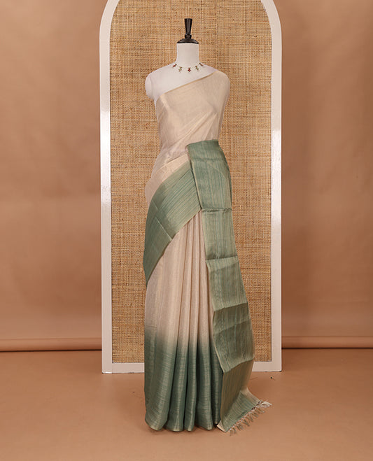 Borderless sandal-green plain ombre-colored tissue saree, plain pallu & circle motifs printed blouse