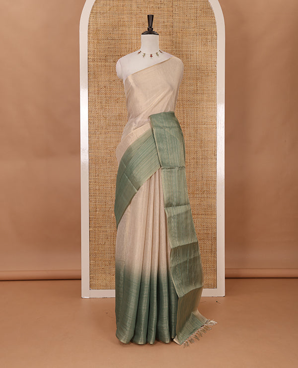 Borderless sandal-green plain ombre-colored tissue saree, plain pallu & circle motifs printed blouse